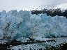 Glacier falling into the water after breaking off