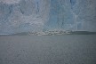 The wave created by ice falling off the glacier into the lake