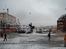 Fisherman statue with the bridge in the background