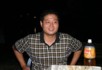 Lily's husband at our first meal in Guilin