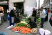 Man making noodles behind the veg stall