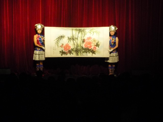 The evening's entertainment starts with an auction of paintings