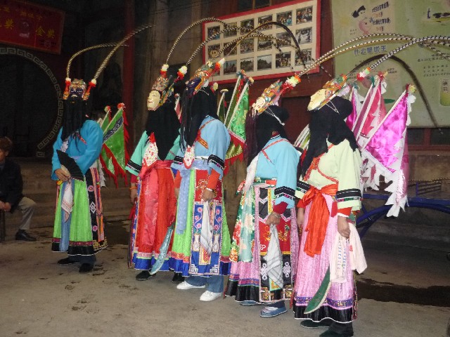 Jichang villagers dancing the ground opera at the Loahan village
