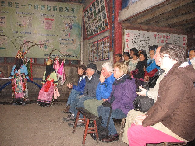 The village came to watch standing behind us