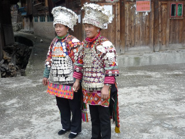 Short skirted Miao village ladies