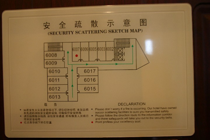 Notice on bedroom door about what to do if there is a fire