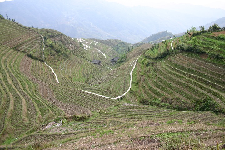 Path wending its way around the contours back to the village
