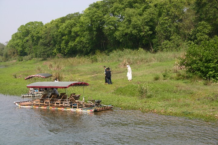 Bride and groom getting ready for wedding shots