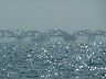 Long bridge out into sea carries oil for the liners to fill up
