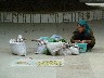 Lady selling dried pulses