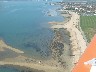 Above the end of the runway
