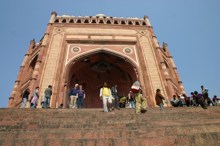 The tourists pose in front of the north entrance