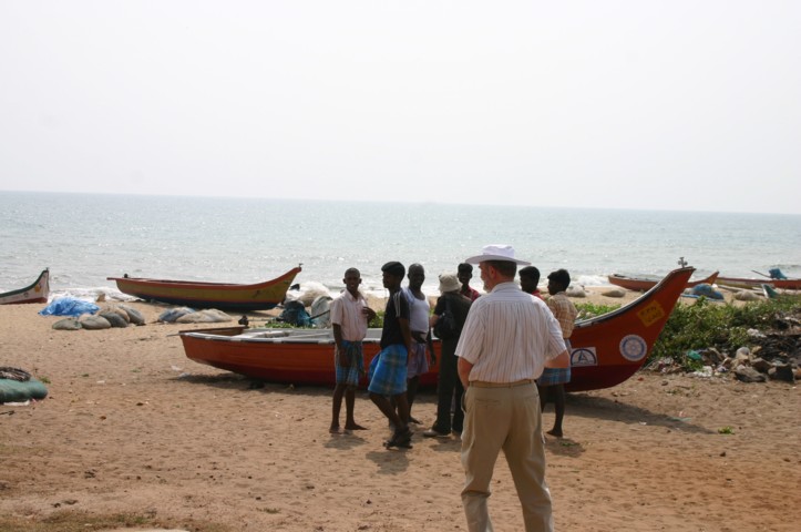 Fishermen with boats
