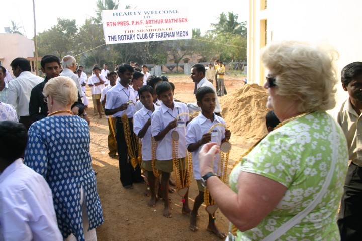 Gettiing garlands at the Selaiyur Boys Home