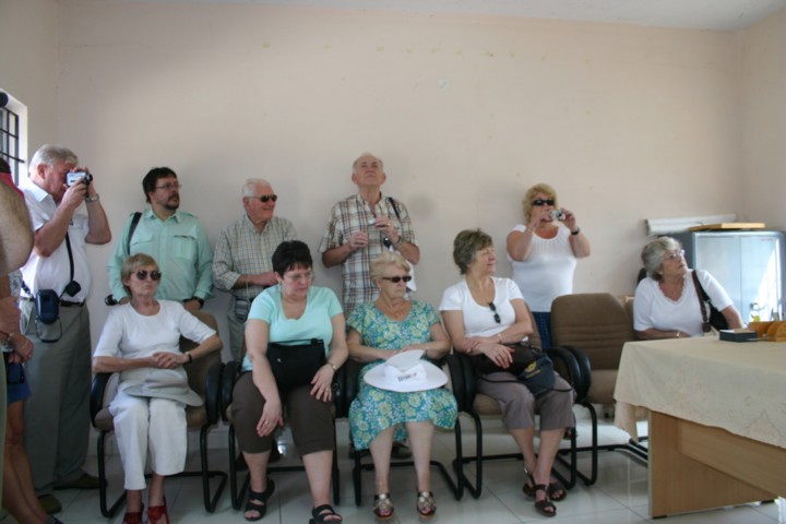 Listening to the speeches at the community centre