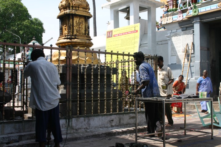 Brass railings being cleaned