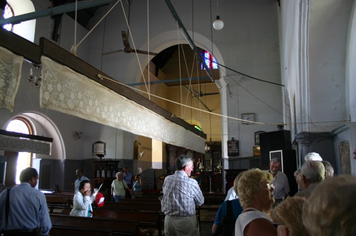 Look at the punkas hanging from the ceiling