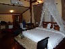 On Mekong at Luang Prabang our bedrom at the Bel Air Hotel