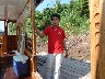 On Mekong at Buddha Cave - captain of the boat