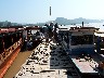 On Mekong at Buddha Cave getting off the boat