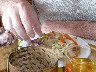 You eat the sticky rice with your fingers