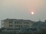 Uong Bi sun over the school