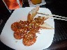 Tiger prawns served with French bread and garlic - eaten with chopsticks